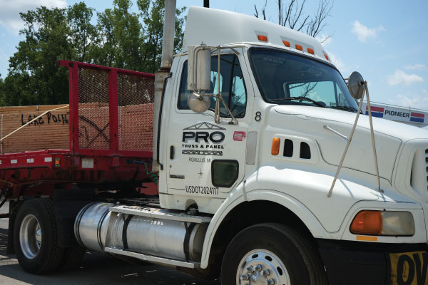 on time delivery of roof trusses floor trusses wall panels to construction site